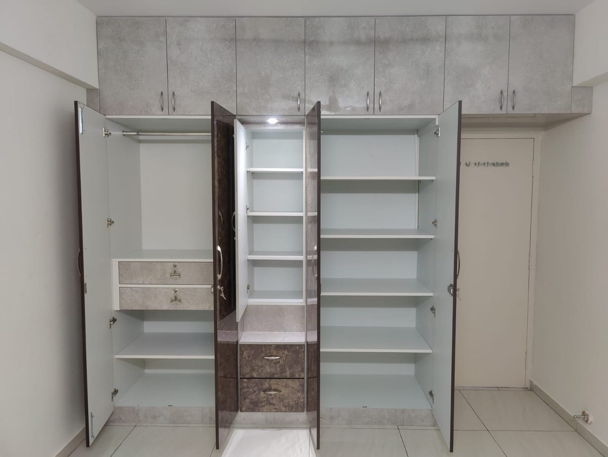 Open wardrobe showing shelves, drawers and hanging space